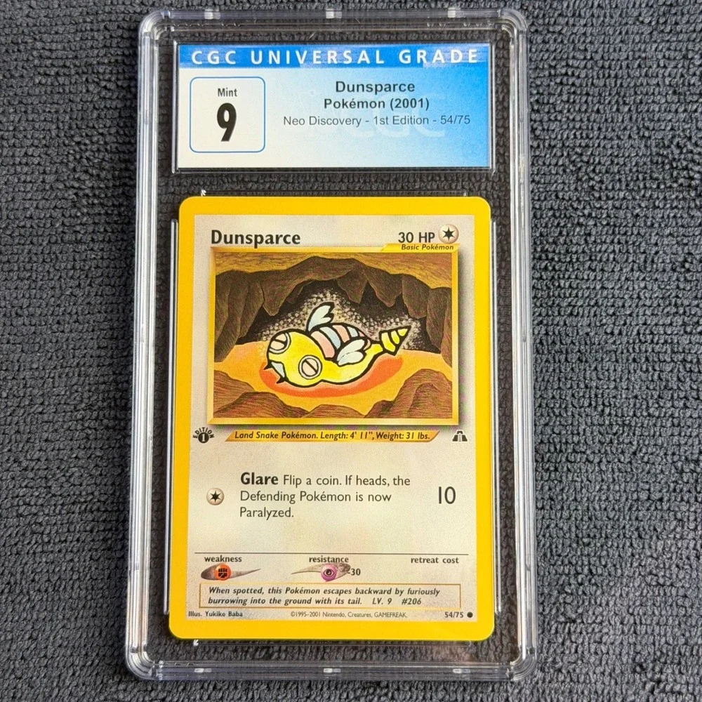 Pokemon Dunsparce 54/75 1st Edition CGC 9 Mint 2001 Neo Discovery TCG Vintage